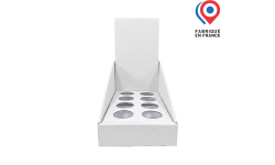 Présentoir de comptoir en carton ondulé avec emplacements ronds, PLV personnalisée pour mise en avant de produits solides.