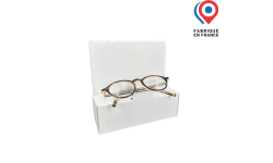 Présentoir de lunettes avec panneau à exposer sur un comptoir de magasin d'optique